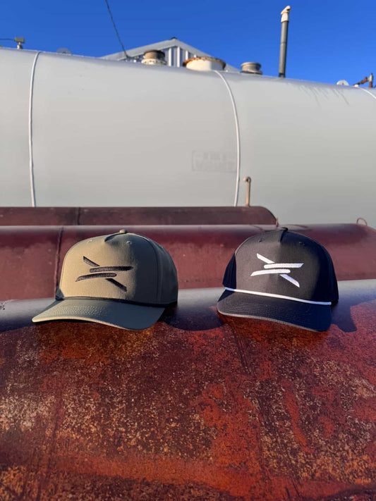The { MN } branded hats