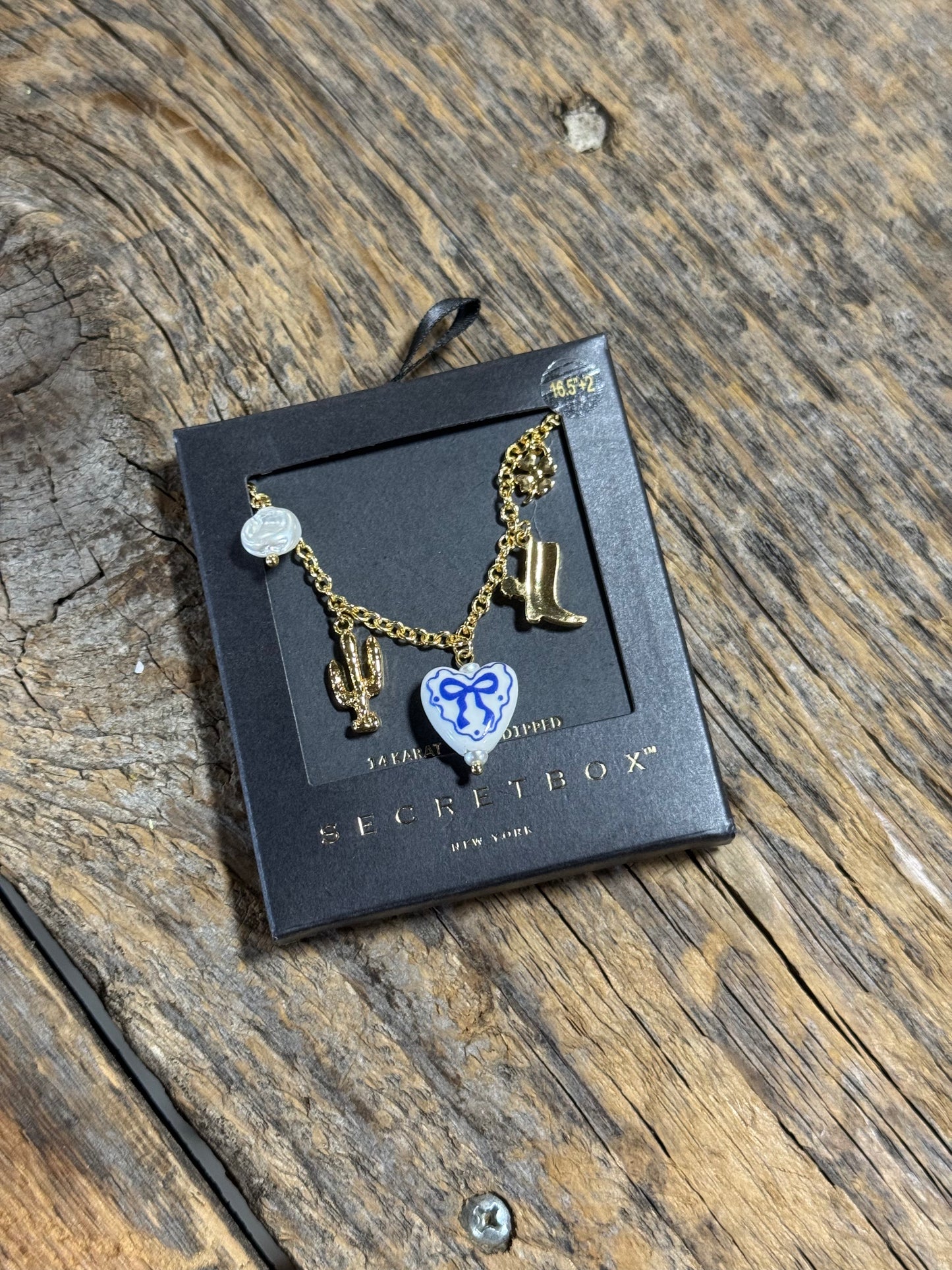 Bow tie charm necklace